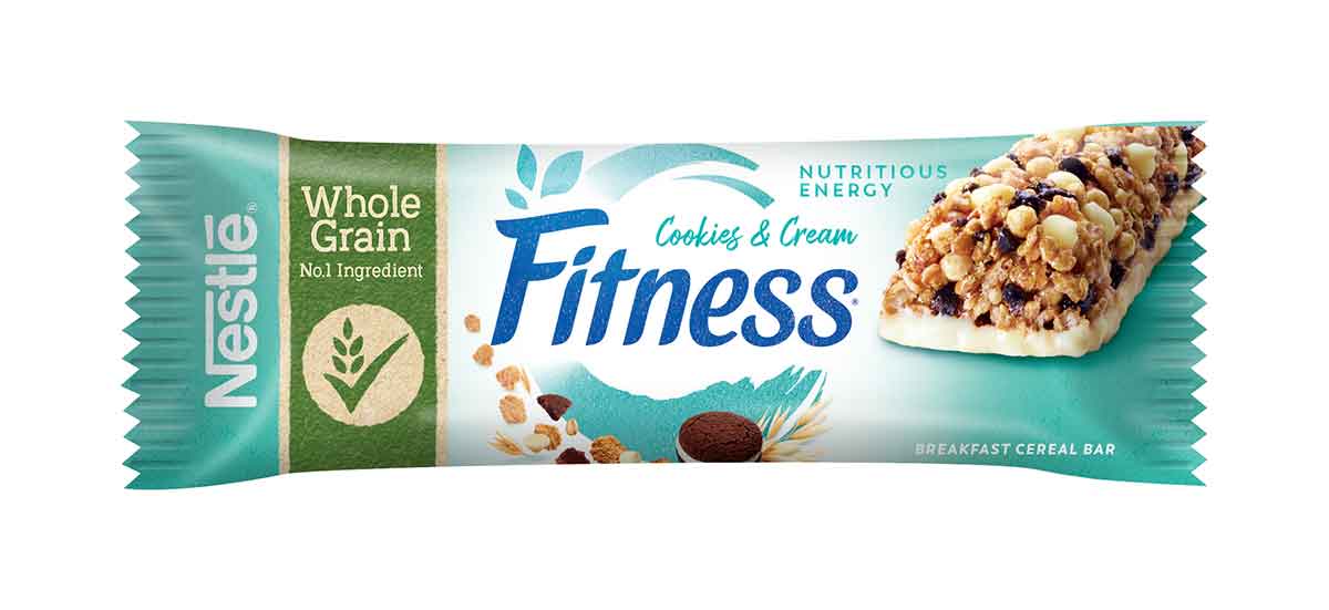 Fitness® COOKIES&CREAM Barrette di cereali con frumento e avena integrali con biscotti al cacao e gocce di cioccolato bianco