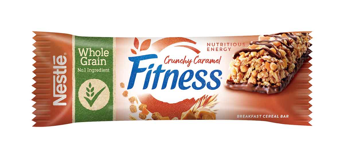 Fitness® CRUNCHY CARAMEL Barrette di cereali con frumento e avena integrali con cioccolato al latte e pepite di caramello