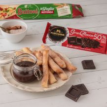 Scopri la ricetta dei churros di sfoglia con crema al cioccolato