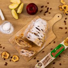 Strudel integrale su tagliere di legno con accanto confezione di pasta sfoglia integrale buitoni, mele e uvetta